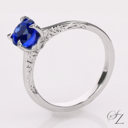 tanzanite-solitaire-ring-with-hidden-diamond-and-filigree-detailing-lstr399