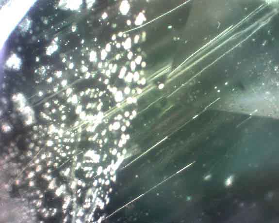Included Crystal and Needles Tsavorite.jpg
