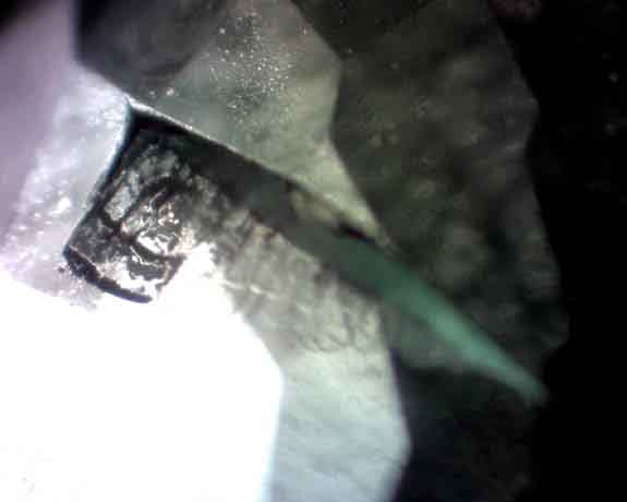 Tsavorite feather inclusion.jpg